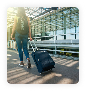 Traveller walking through an airport